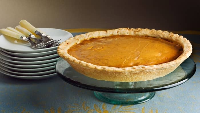  How long do you cook two pumpkin pies in the oven?